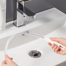 Brosse de débouchage pour canalisations_en action